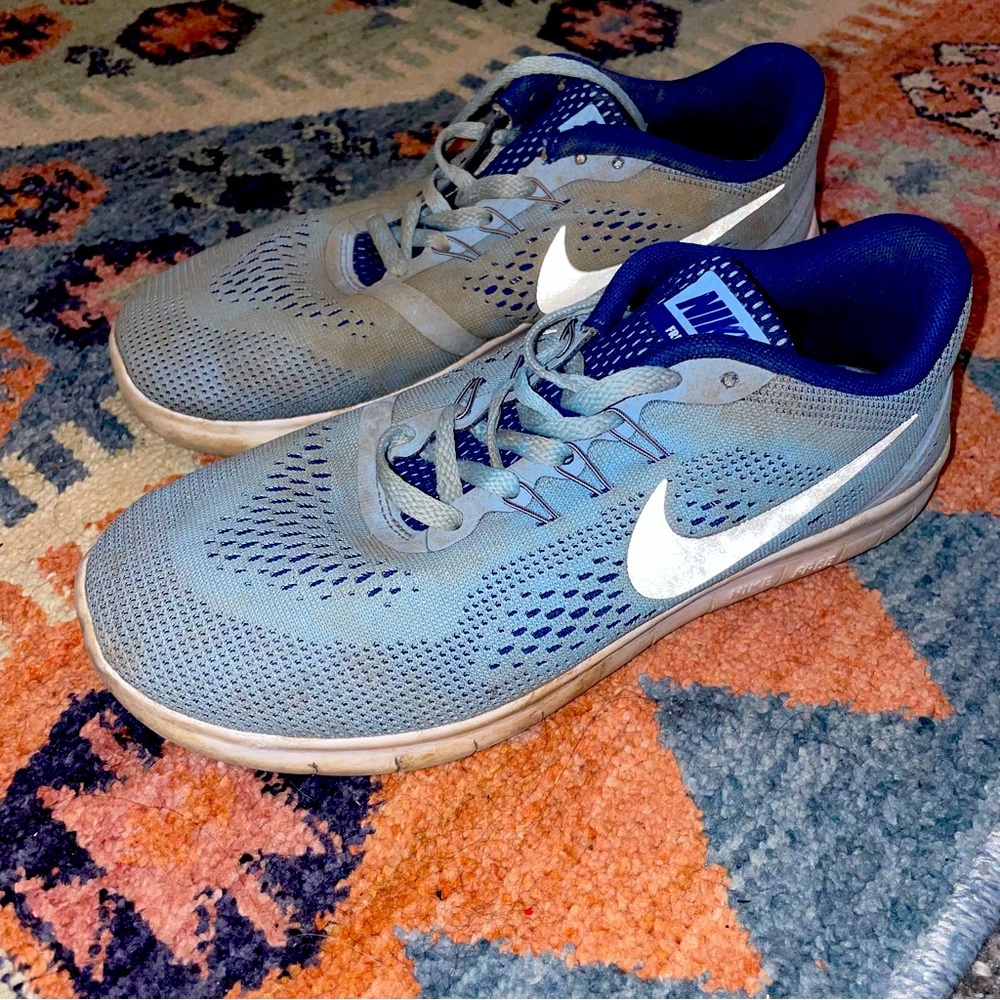 Well worn womens nikes- free runs track shoes